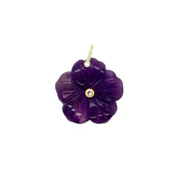 Purple flower-shaped pendant with a gold accents on a white background