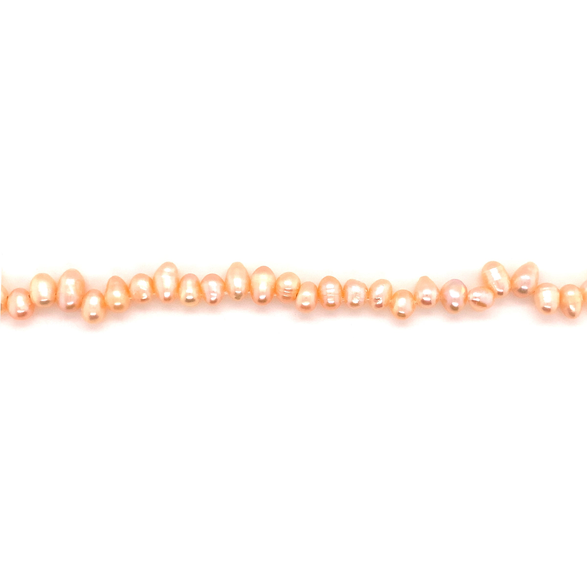 Peach Rice Baroque Freshwater Pearls